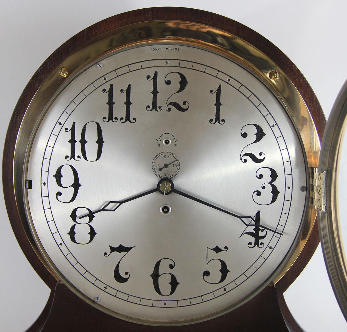 E. Howard 12 inch Marine Clock with Unusual Arabic Numerals